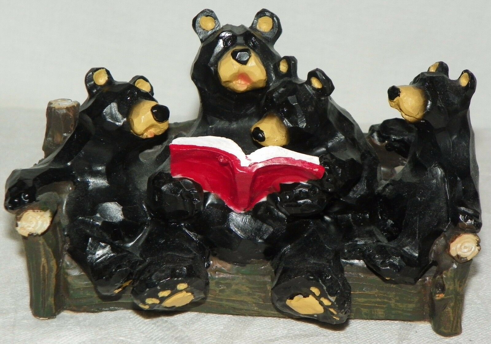 Four Bears Reading A Story Book On A Park Bench By Slifka Woodsy Cabin ...